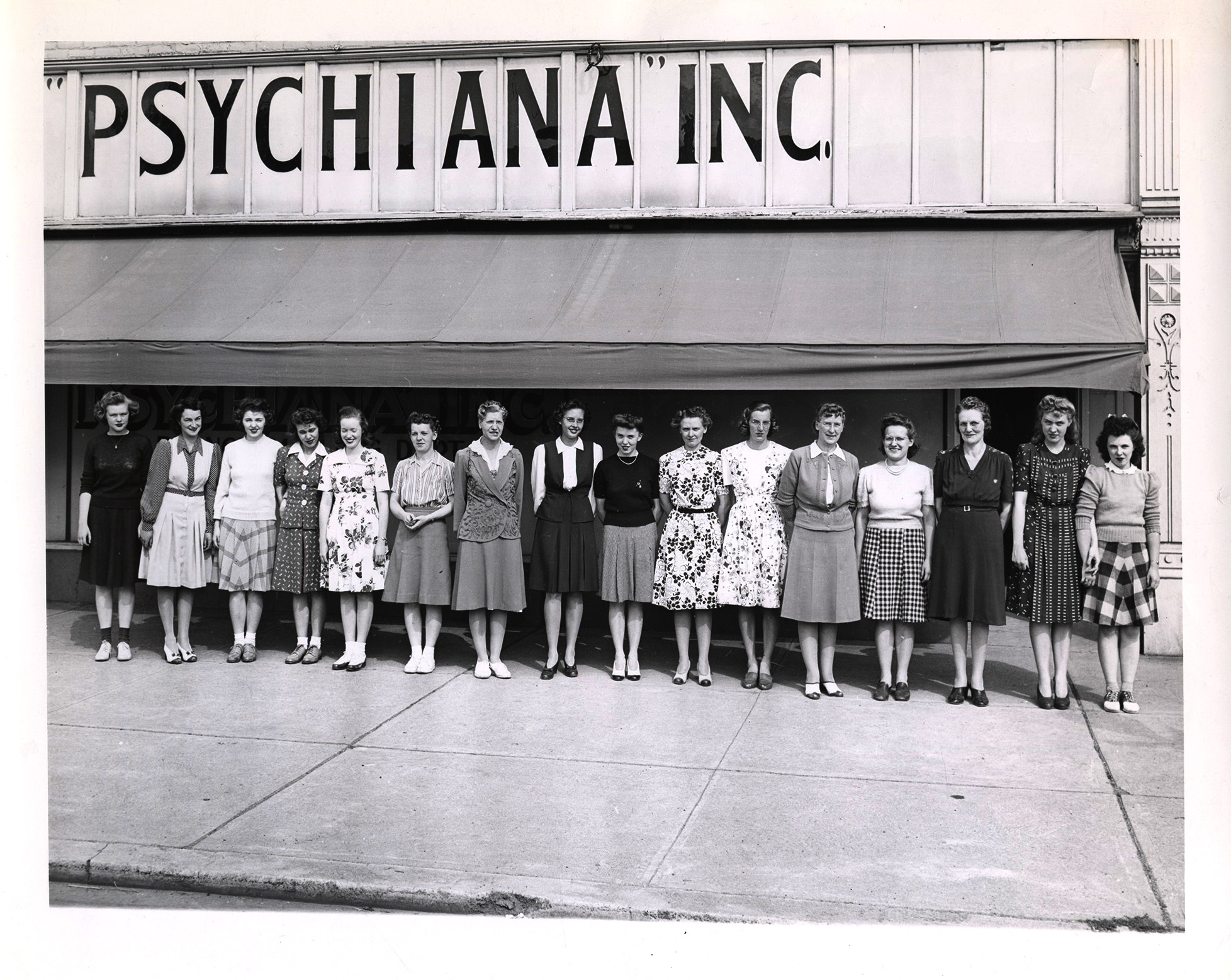 Photograph of clerical and bookkeeping staff from the branch mailing department.